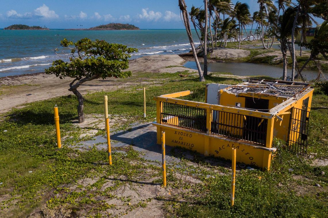 The popular beachfront food kiosk “El Amarillo” was destroyed after Hurricane Maria made its way through Puerto Rico last year. The owner Jose Luis Aponte Cruz is now operating temporarily under a tent in a parking lot.
