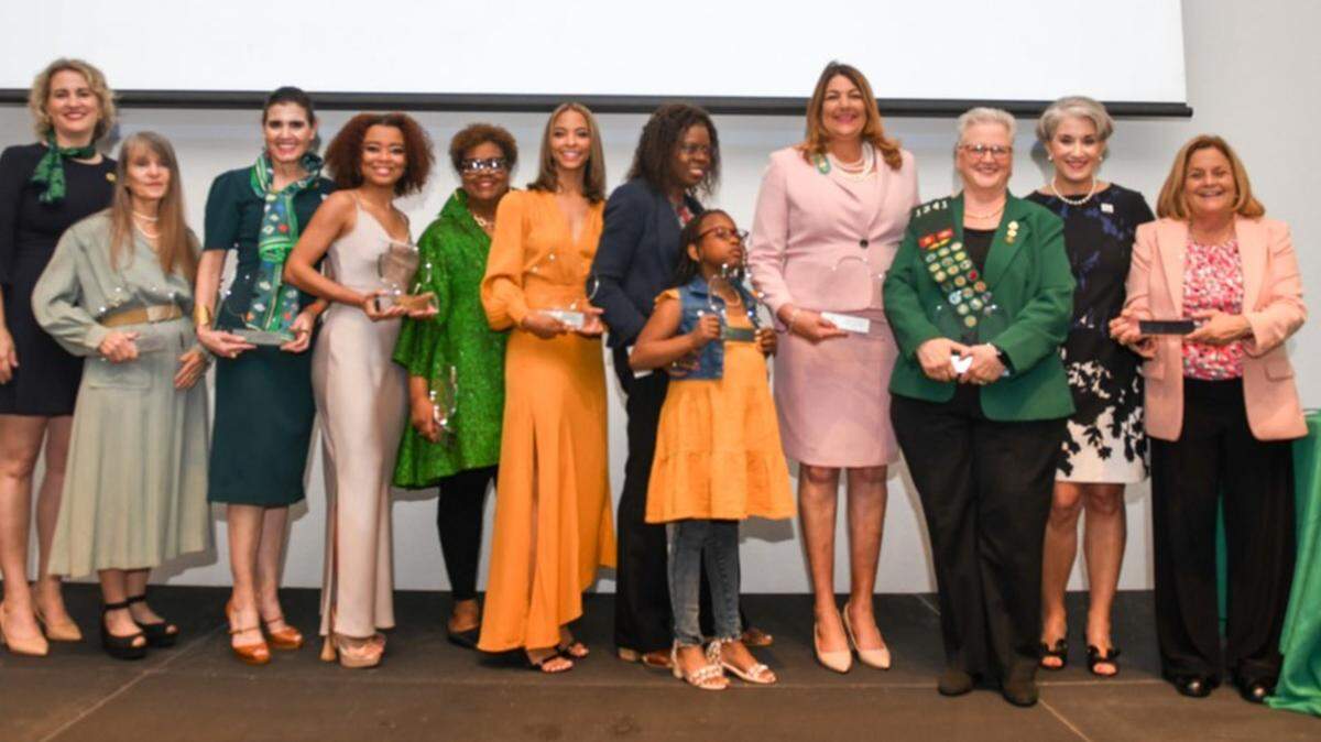 Celebrating a centennial of Girl Scouting at the leadership award ceremony are Chelsea Wilkerson, Marice Band, Ana VeigaMilton, Lucia Davis-Raiford, Constance Jones, Elmay Hatcher and Ori Pearson (on behalf of honoree Felecia Hatcher), Madeline Pumariega, Penny Shaffer, Sarah Artecona, and Ileana Ros-Lehtinen. 