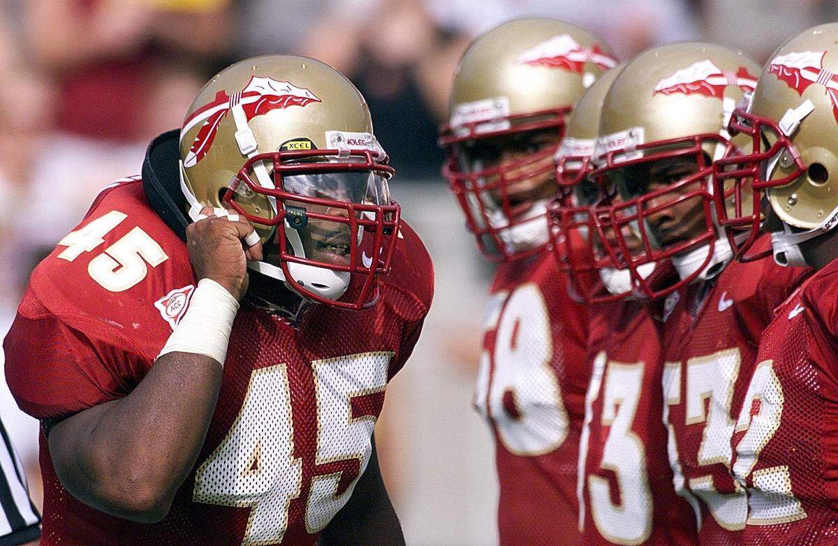 Lamont Green calls defensive signal during USC game.