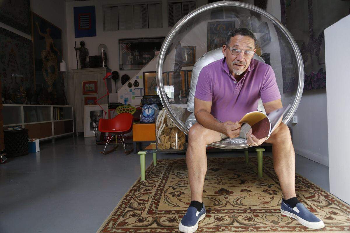 International renowned Haitian artist Edouard Duval-Carrie sits in his studio in Miami’s Little Haiti neighborhood.