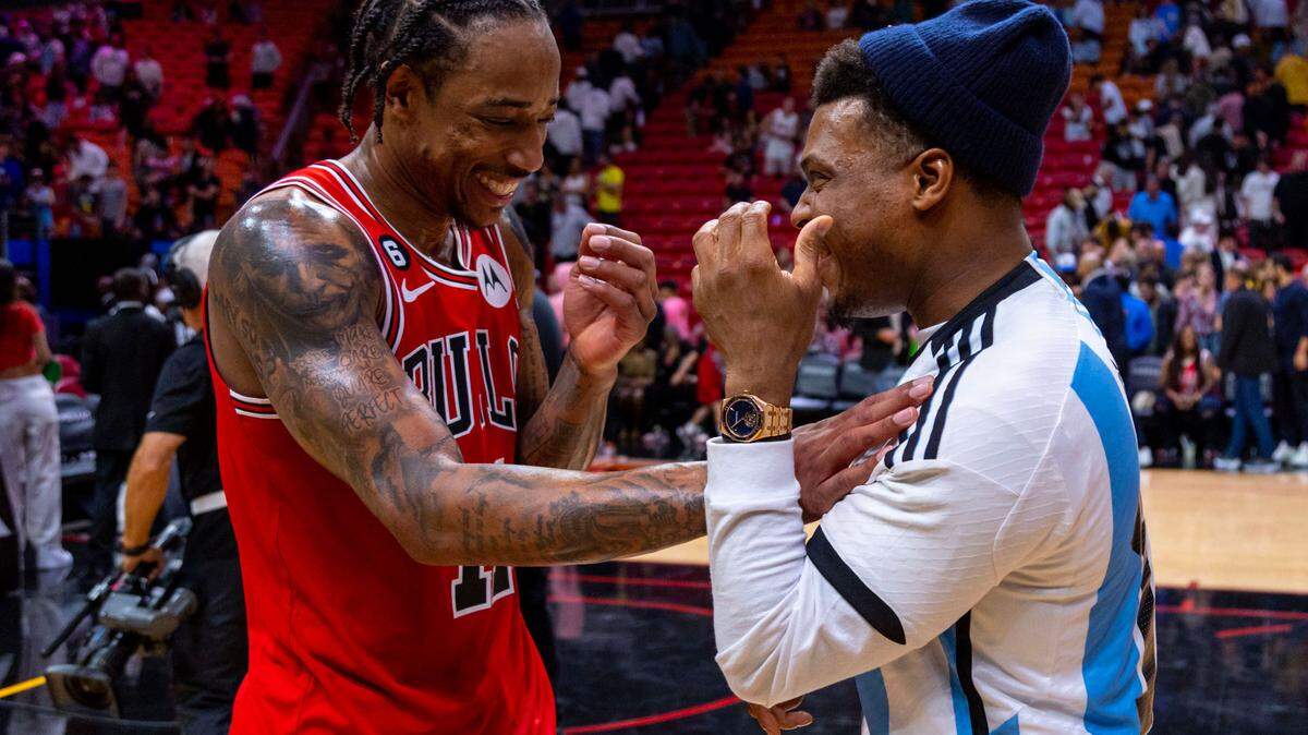 Chicago Bulls forward DeMar DeRozan (11) interacts with Miami Heat point guard Kyle Lowry (7) after the second half of an NBA game at FTX Arena in Downtown Miami, Florida, on Tuesday, December 20, 2022. Chicago defeated Miami 113-103.