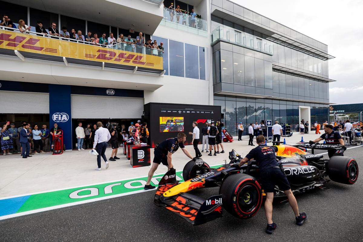 Red Bull Racing driver Max Verstappen of Netherlands car is pushed by crew members after he placed second in a Race Qualifying session on the second day of the Formula One Miami Grand Prix at the Miami International Autodrome on Saturday, May 3, 2025, in Miami Gardens, Fla.