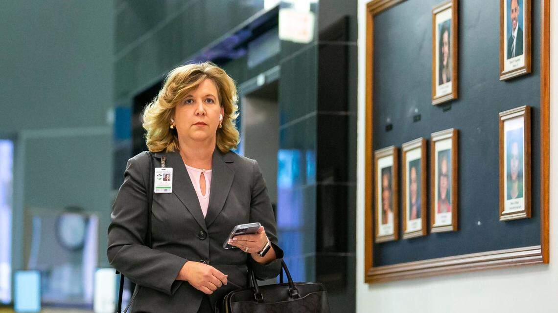 Broward Schools Superintendent Vickie Cartwright exits the Kathleen C. Wright Administration Center after Florida Governor Ron DeSantis suspended four Broward County School Board members. As Cartwright left the building, she made her way past a black bulletin board only displaying the five remaining members on Friday, Aug. 26, 2022, in Fort Lauderdale, Fla. On Thursday, Sept. 15, the chair of the Florida Board of Education asked whether the board, appointed byGov. Ron DeSantis, can suspend Cartwright.