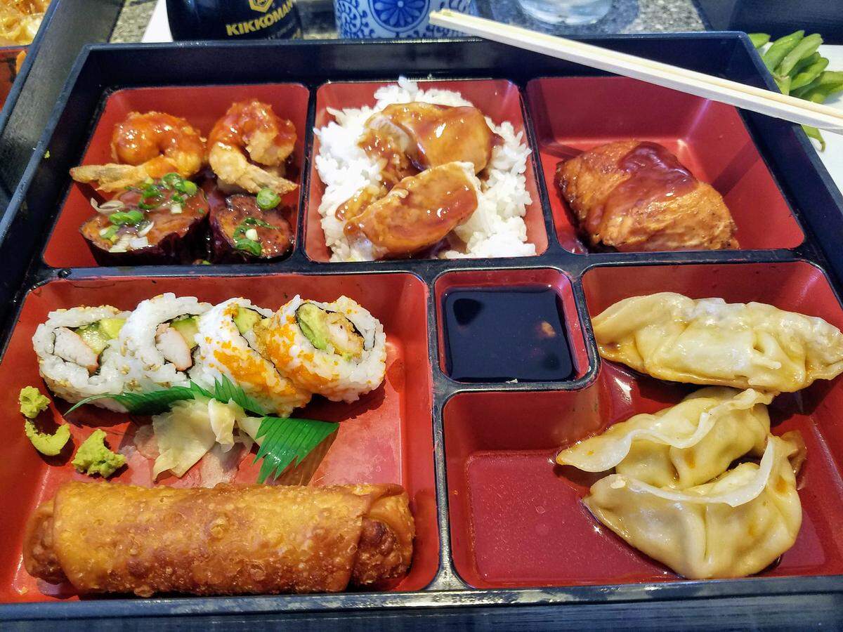 The classic bento at Morikami comes with chicken teriyaki and rice, salmon teriyaki, dumplings, Asian eggplant, red shrimp, golden tofu, and egg roll and sushi roll pieces. You can also order a vegetarian version.