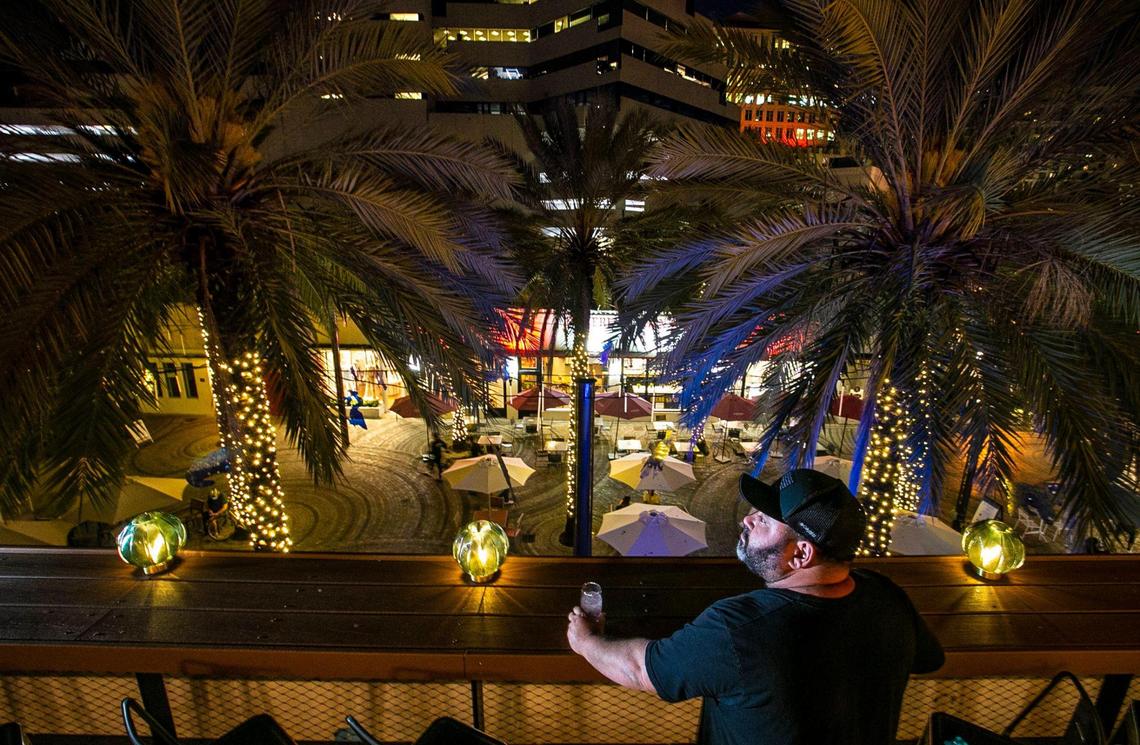 Chef and restaurant owner Jorgie Ramos, a partner at Cebada, looks out over Giralda Plaza as he anticipates the upcoming opening of his rooftop restaurant in Coral Gables.