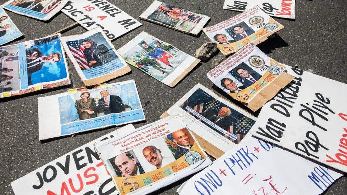 Protest signs lie on the ground before a rally in March in Port-au-Prince, Haiti, to denounce President Jovenel Moïse’s efforts to stay in office past his term.