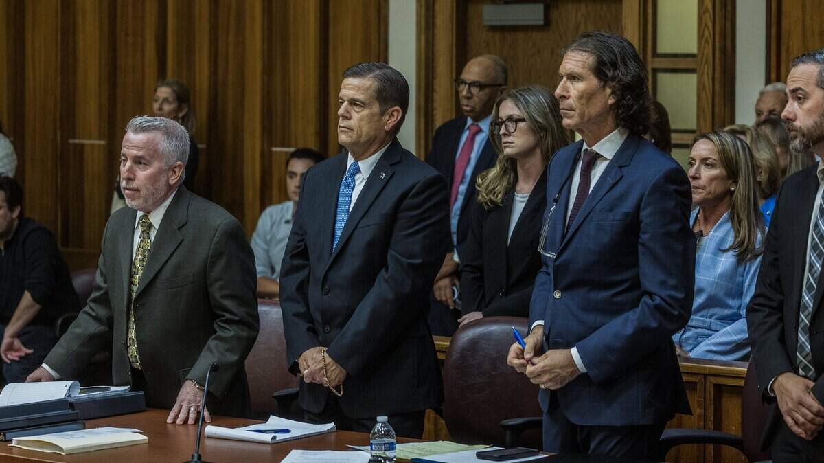 From left- Defense attorneys Mark Shapiro, Howard Srebnick and Ed Amellino, flanked defendant George Pino (second from left), with his daughter Carolina (left) and his wife, Cecilia Pino (second row), stand up as Judge Marisa Tinkler Mendez speaks during a motion hearing, as he is facing vessel homicide charges related to the 2022 boat crash that killed an Our Lady of Lourdes Academy student, in Courtroom 4-6, at the Richard E. Gerstein Justice Building, on Wednesday, May 27, 2026.