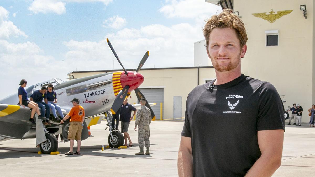 US Air Force recruit Garrett Scarborough, 22, from Titusville, Florida, swore an enlistment oath during a ceremony at the U.S. Coast Guard Air Station Miami in Opa-Locka, Florida, on Friday, May 24, 2019. Scarborough wants to pursue a career with the United States Air Force Pararescue division, who are tasked with the recovery and medical treatment of personnel in humanitarian and combat environments.