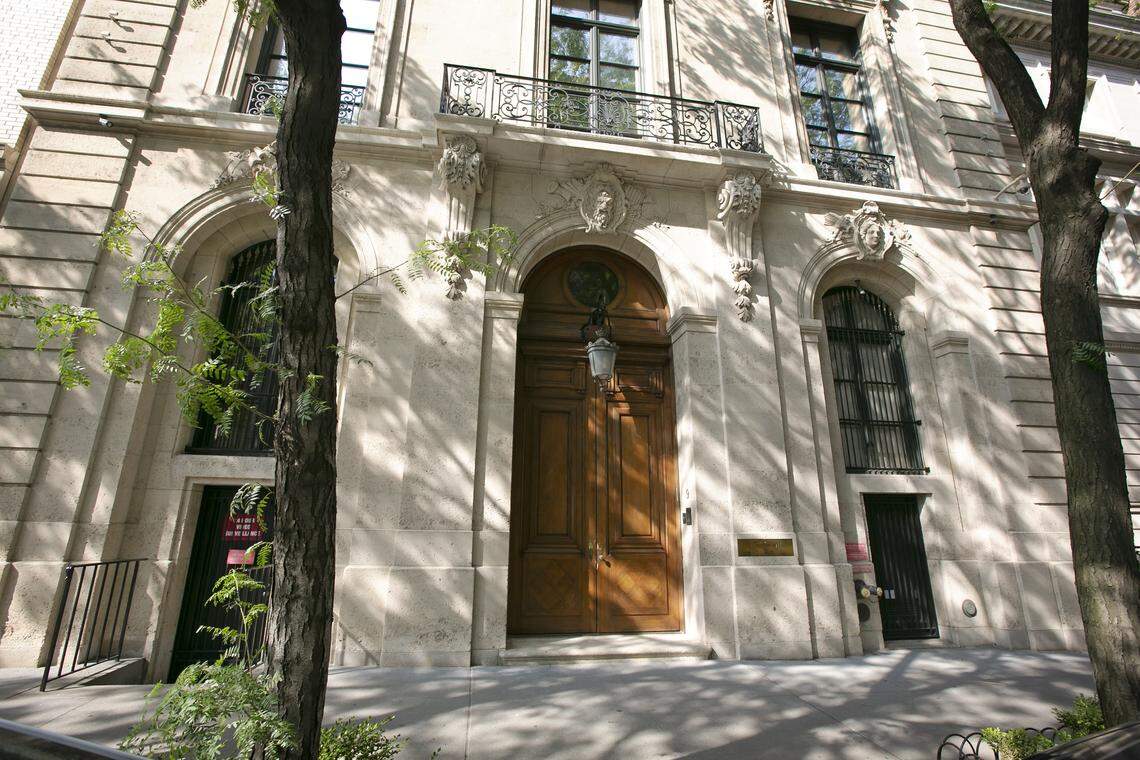 The Upper East Side New York estate of multimillionaire Jeffrey Epstein. Damage on the front doors of Epstein’s residence was caused by agents serving a search warrant following Epstein’s arrest at a nearby New Jersey airport Saturday July 6, 2019 . Epstein has been charged with sex trafficking of minors in New York and Palm Beach, Fl. and remains behind bars awaiting a bond hearing.