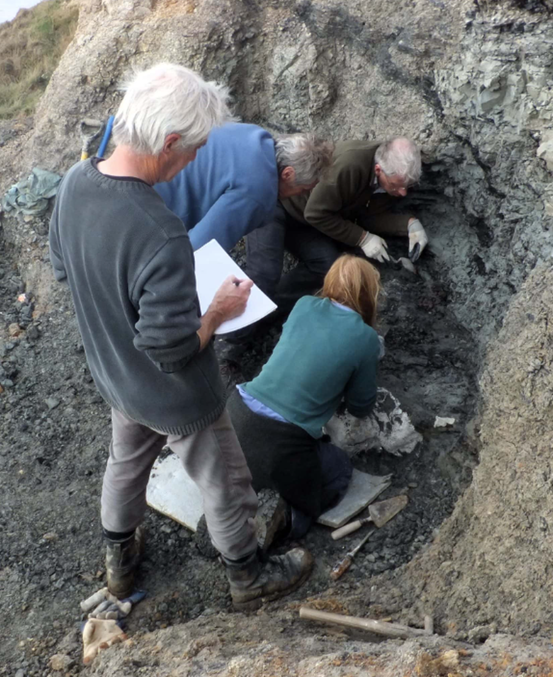 Nick Chase, far left, first discovered the fossils and reported them to paleontologists. He now shares a name with the new species.