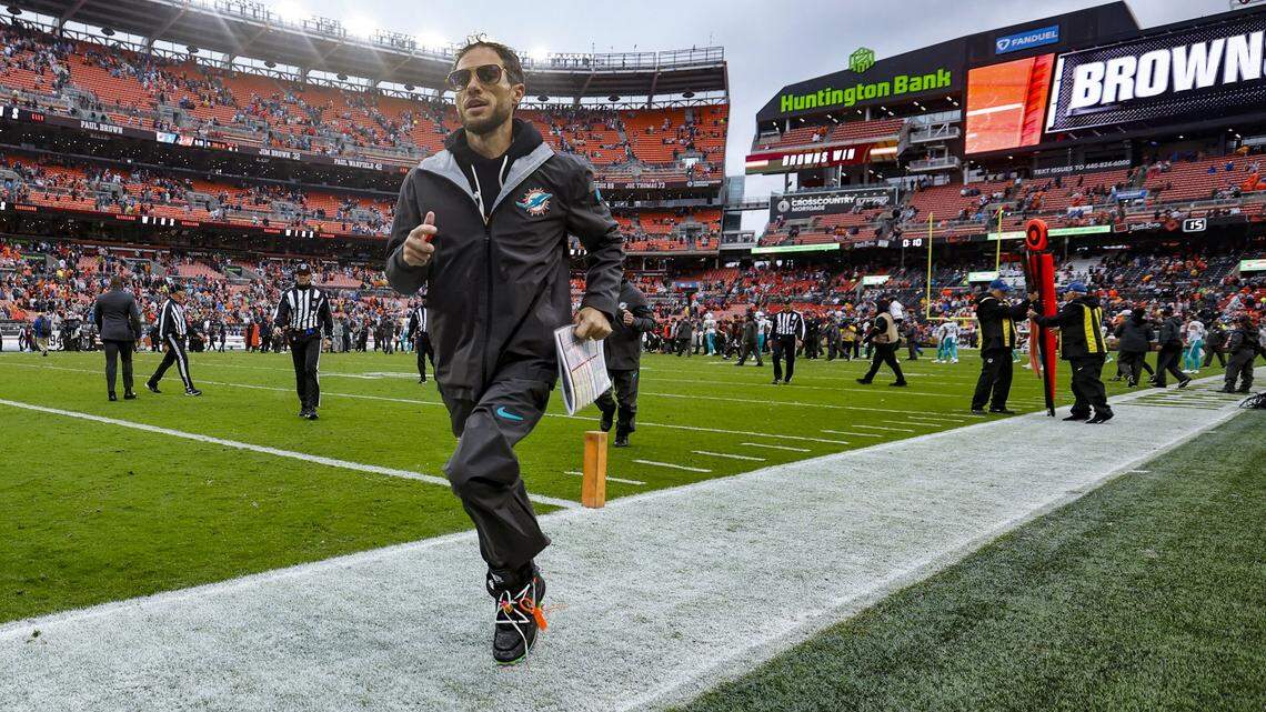Miami Dolphins head coach Mike McDaniel runs off the field after the Cleveland Browns defeat the Dolphins during their NFL football game at Huntington Bank Field in Cleveland, Ohio, on Sunday, October 19, 2025. 