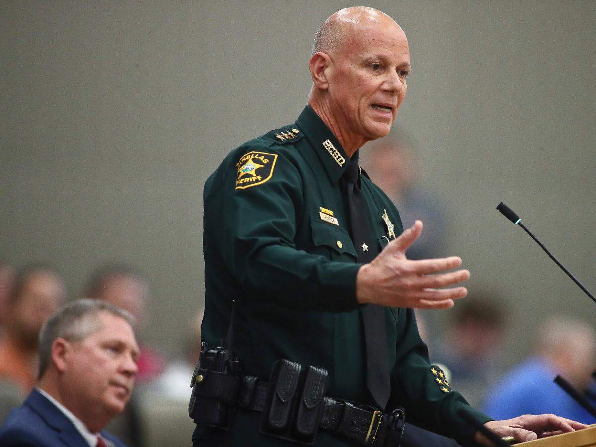 Pinellas County Sheriff Bob Gualtieri speaks in favor of House Bill 543: Concealed Carry of Weapons and Firearms Without a License in the Constitutional Rights, Rule of Law & Government Operations Subcommittee meeting on Tuesday, Feb. 7, 2023, at the Capitol in Tallahassee, Fla. At left is Rep. Chuck Brannan III, R-Macclenny, co-sponsor of the bill. (AP Photo/Phil Sears)
