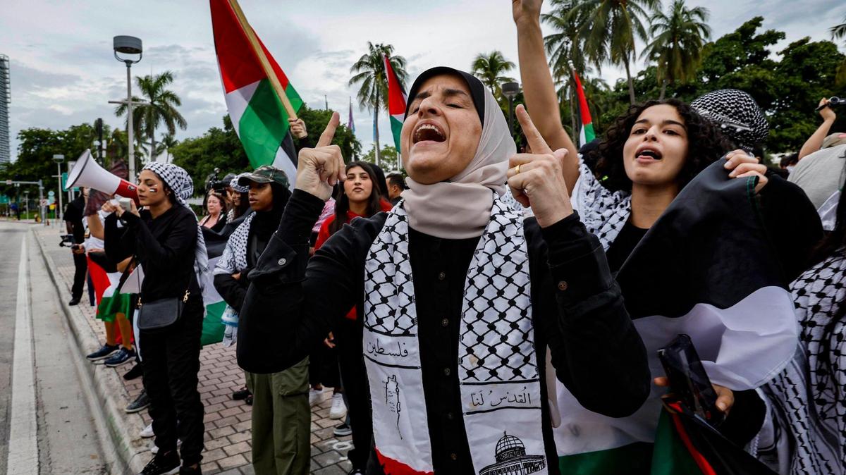 Pro-Palestinian protesters rally in support of Palestinians in Gaza during the conflict between Israel and Hamas along Biscayne Blvd. at Bayfront Park in Miami on Friday, October 13, 2023.