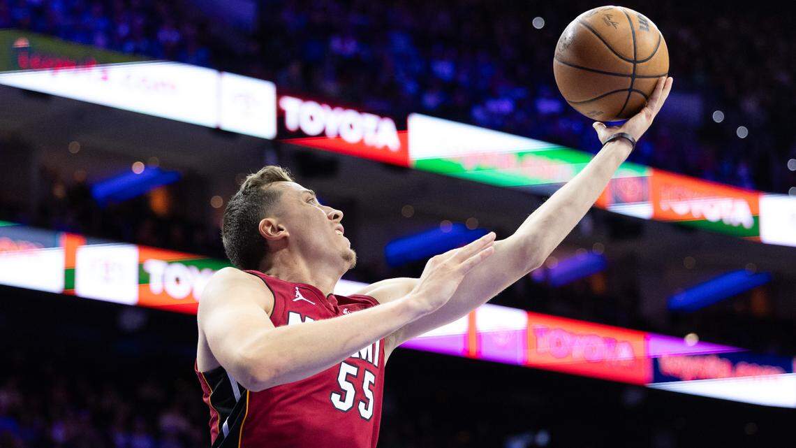 Miami Heat forward Duncan Robinson (55) drives for a shot against the Philadelphia 76ers during the third quarter at Wells Fargo Center.