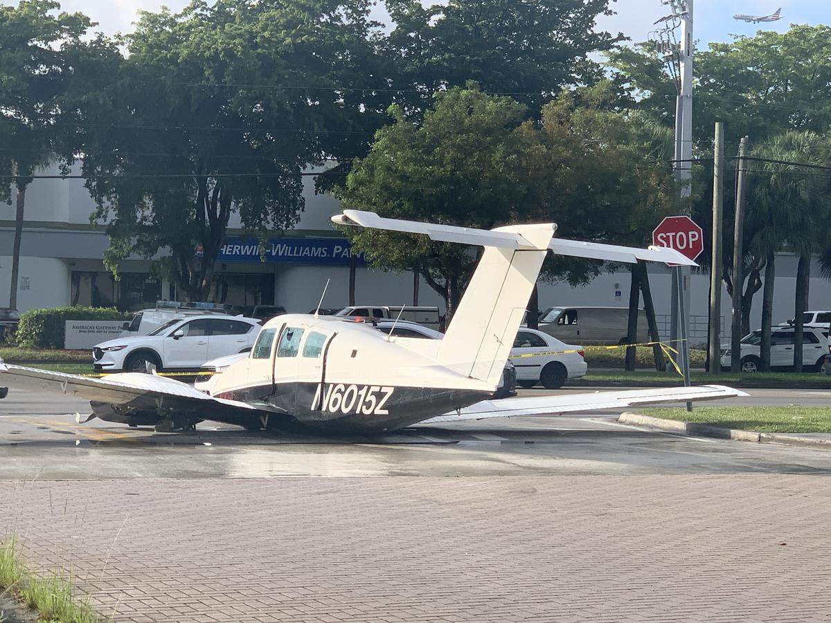 A small plane crash-landed in Doral near Miami-Dade Police headquarters. It remained on the street Monday morning.