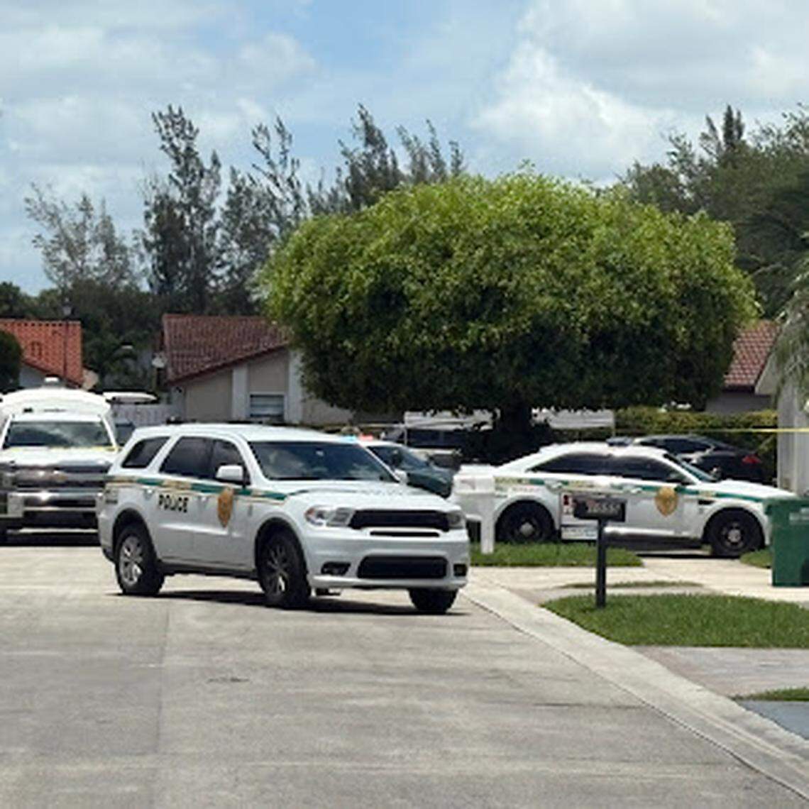 Heavy police presence outside a home on the 1000 block of Northwest 127th Path in the Tamiami area where a woman was found dead on Friday morning.
