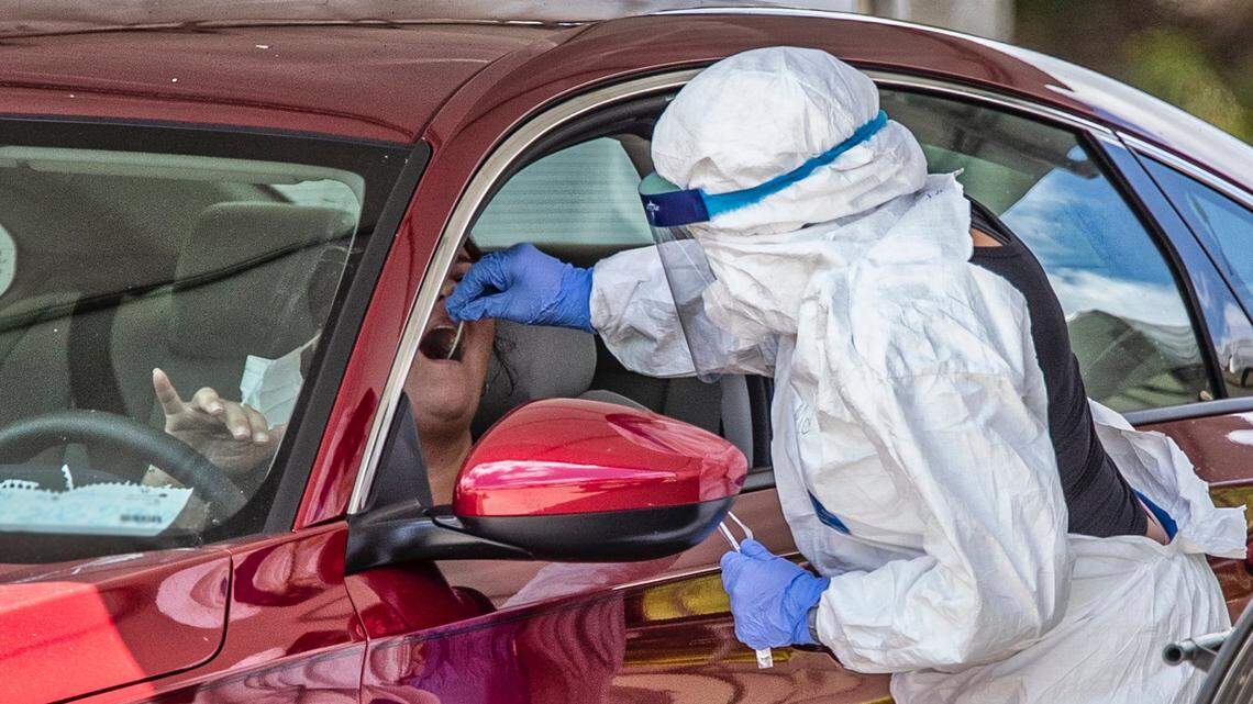 As Florida reports record number of COVID-19 cases, some call for a stricter response