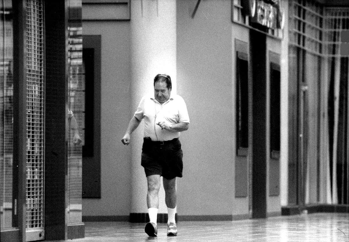 Moe Kaplan walks inside the Sawgrass Mills mall early in the morning before the stores open in 1993.