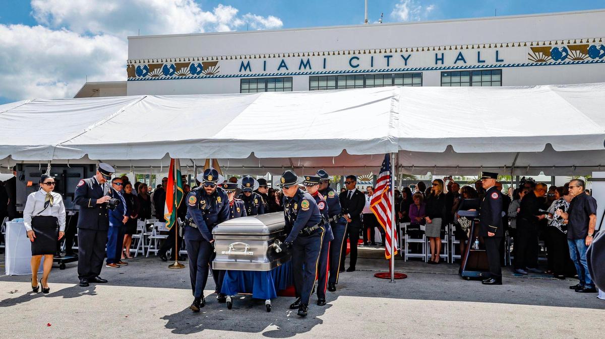 City of Miami Police and Fire Honor Guard members carry the casket of Miami City Commissioner Manolo Reyes after a memorial service at Miami City Hall on Wednesday, April 16, 2025.