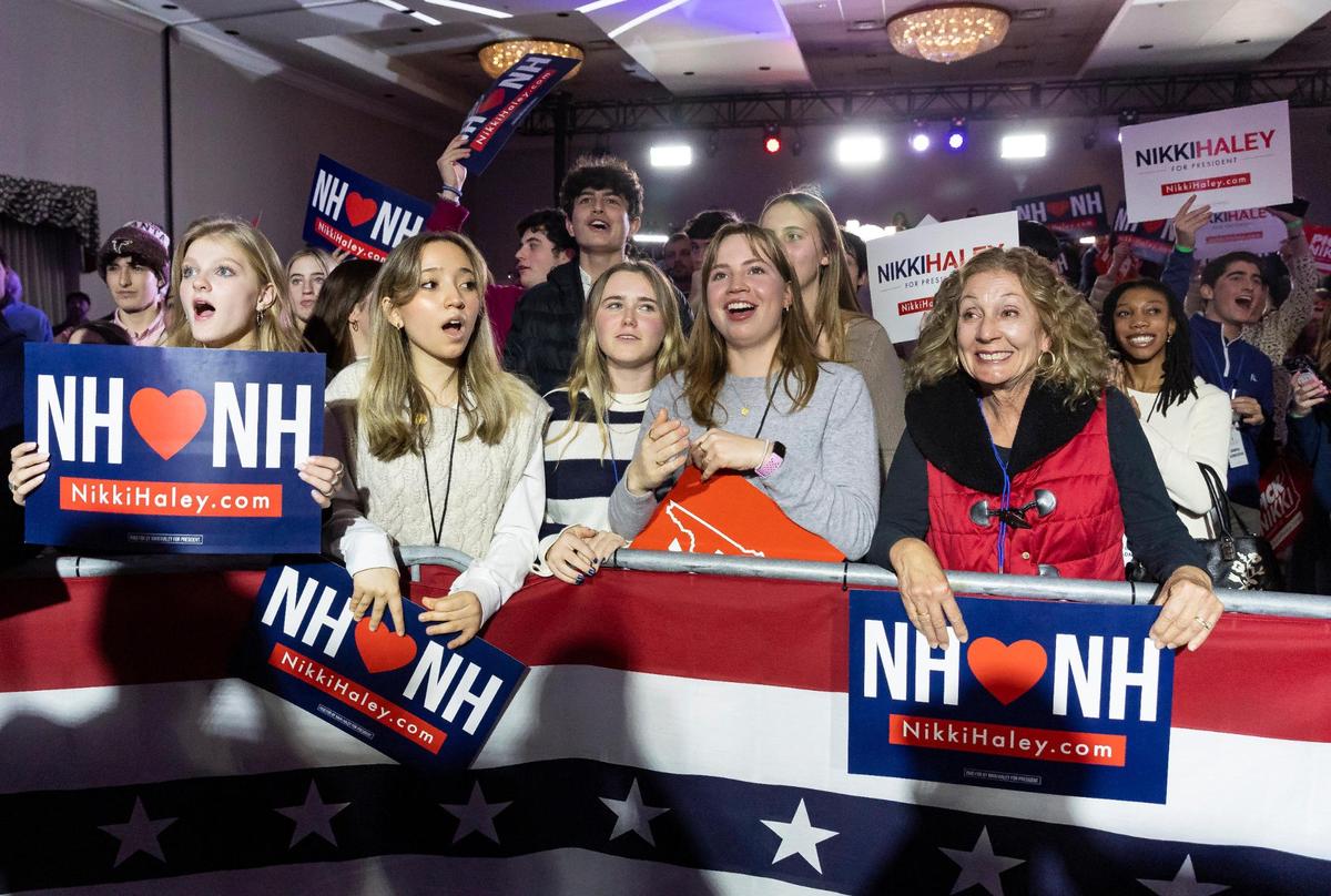 Supporters of former United Nations Ambassador Nikki Haley watch as results are announced during a primary night watch party at the Grappone Conference Center on Tuesday, Jan. 24, 2024, in Concord, New Hampshire. Haley placed second against former President Donald Trump in the state’s Republican presidential primary.