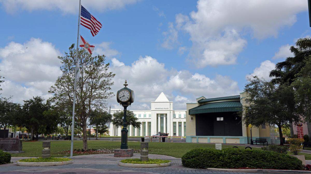 The new Homestead Police Station stands in the background of Losner Park. City officials have warned residents of a telephone scam where someone posing as a utilities representative demands payment over the phone.