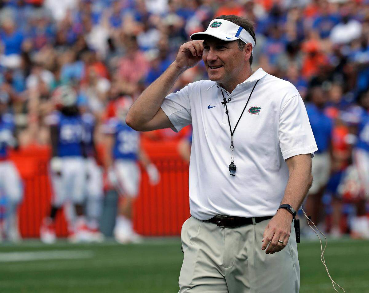 Florida head coach Dan Mullen walks on the field during an NCAA spring college football intrasquad game, Saturday, April 14, 2018, in Gainesville.