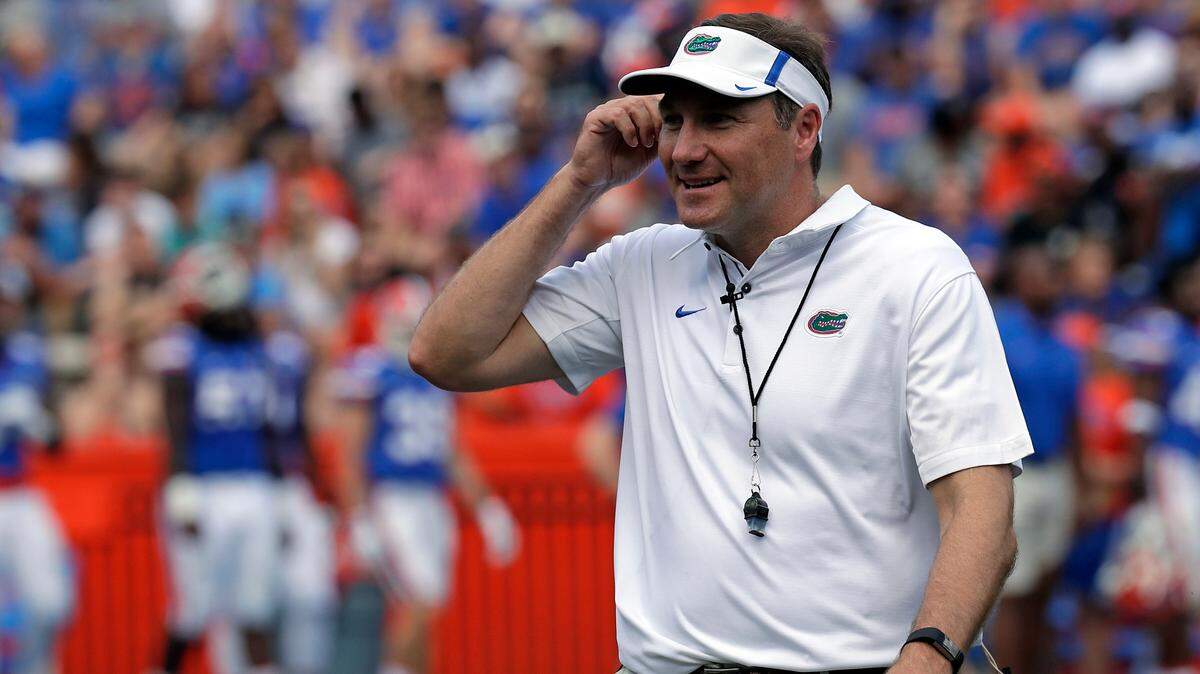 Florida head coach Dan Mullen walks on the field during an NCAA spring college football intrasquad game, Saturday, April 14, 2018, in Gainesville.