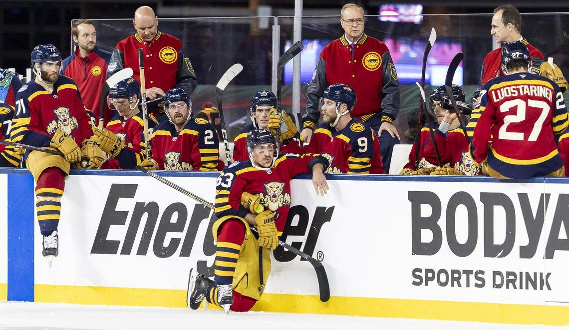 Florida Panthers left wing Brad Marchand (63) looks on by the bench during a timeout in the third period of his Winter Classic outdoor hockey game against the New York Rangers at loanDepot park on Friday, Jan. 2, 2026, in Miami, Fla.