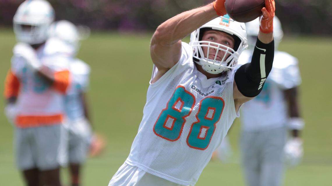 Tight end Mike Gesicki catches the ball during passing drills. On Tuesday, May 17, 2022, Dolphins gave media the availability to video and photograph players during light practice and stretching sessions at the Baptist Health Training Complex at Hard Rock Stadium in Miami Gardens, Florida.