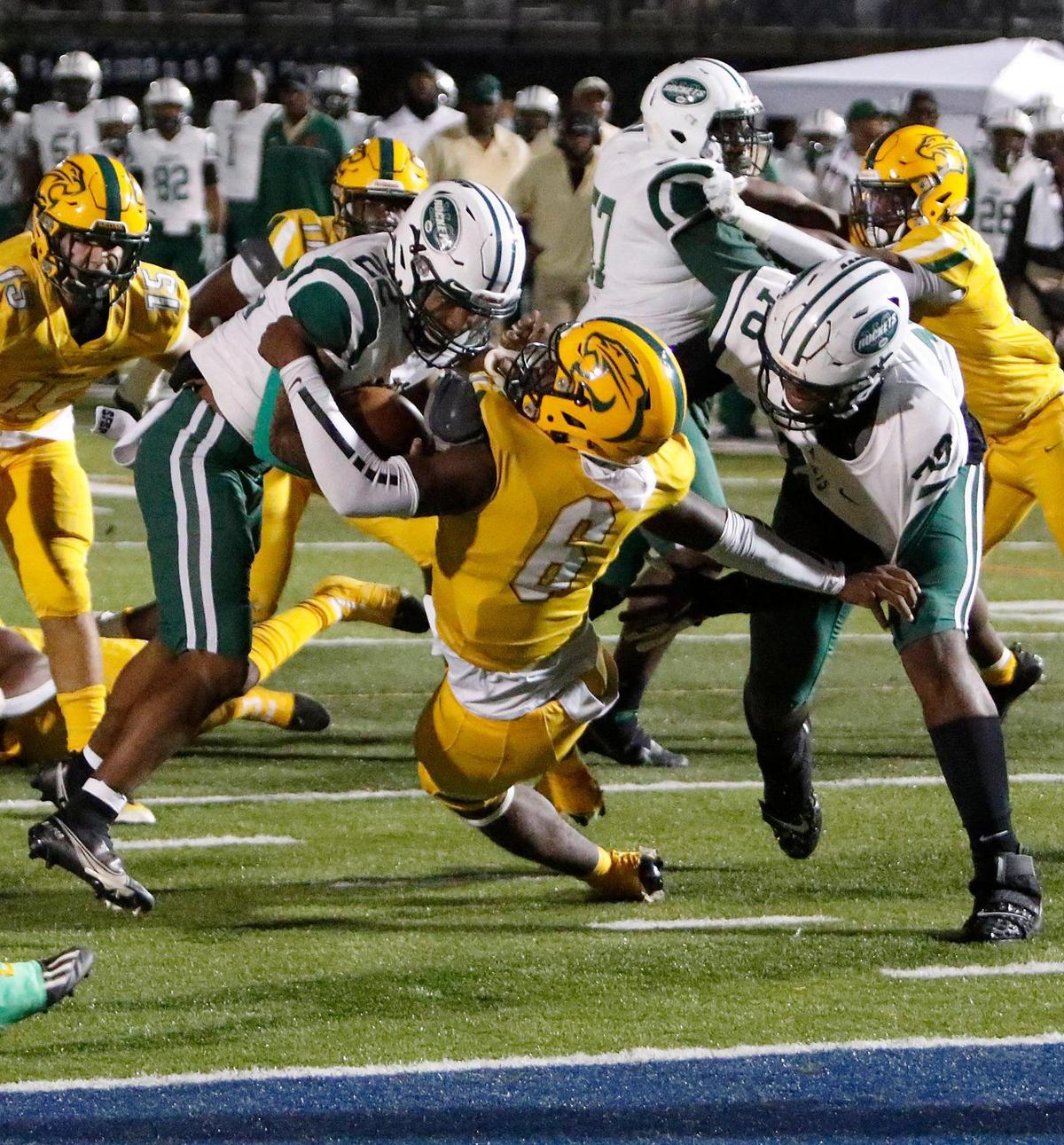 Miami Central Rockets running back Jonathan Harris (22) goes for a touchdown against Killian Cougars during the FHSAA Region 4-5A high school football championship on Saturday, November 27, 2021 at Tropical Park in Miami. Andrew Uloza / for THE MIAMI HERALD