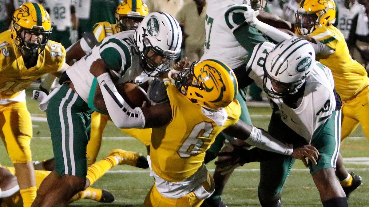Miami Central Rockets running back Jonathan Harris (22) goes for a touchdown against Killian Cougars during the FHSAA Region 4-5A high school football championship on Saturday, November 27, 2021 at Tropical Park in Miami. Andrew Uloza / for THE MIAMI HERALD
