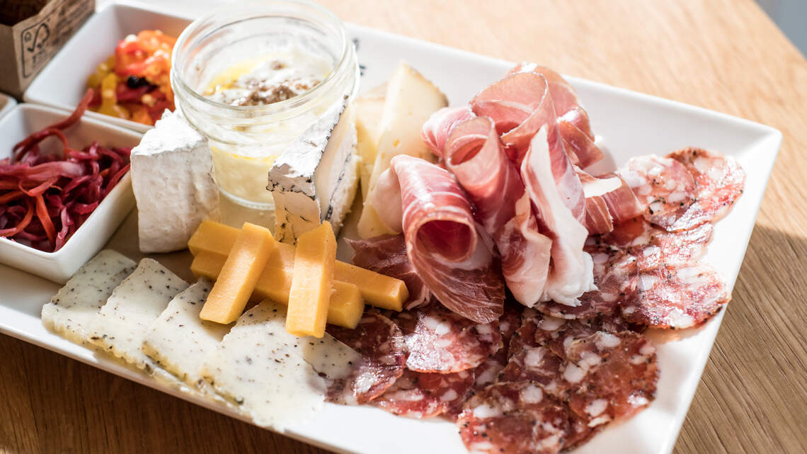Brimming over with fine meats and cheeses, charcuterie boards have become a constant savory presence in menus all over Miami