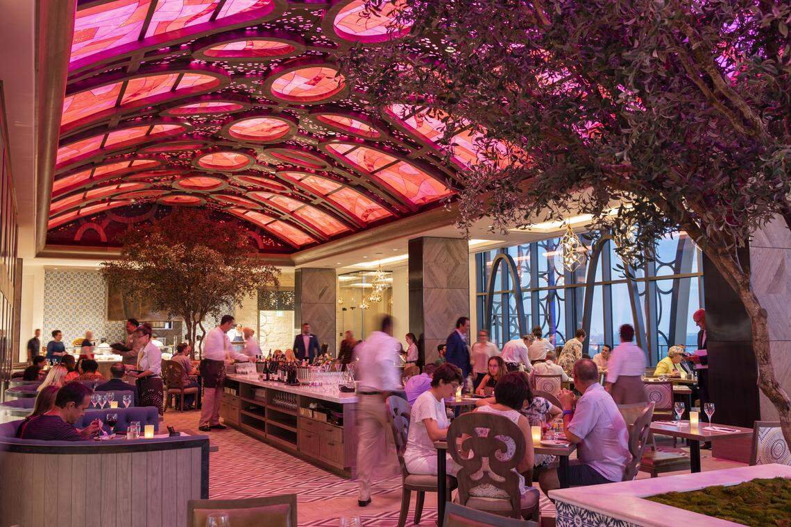 Guests will dine under live olive trees in Tolédo – Tapas, Steak & Seafood, a table-service dining restaurant at the Gran Destino Tower.