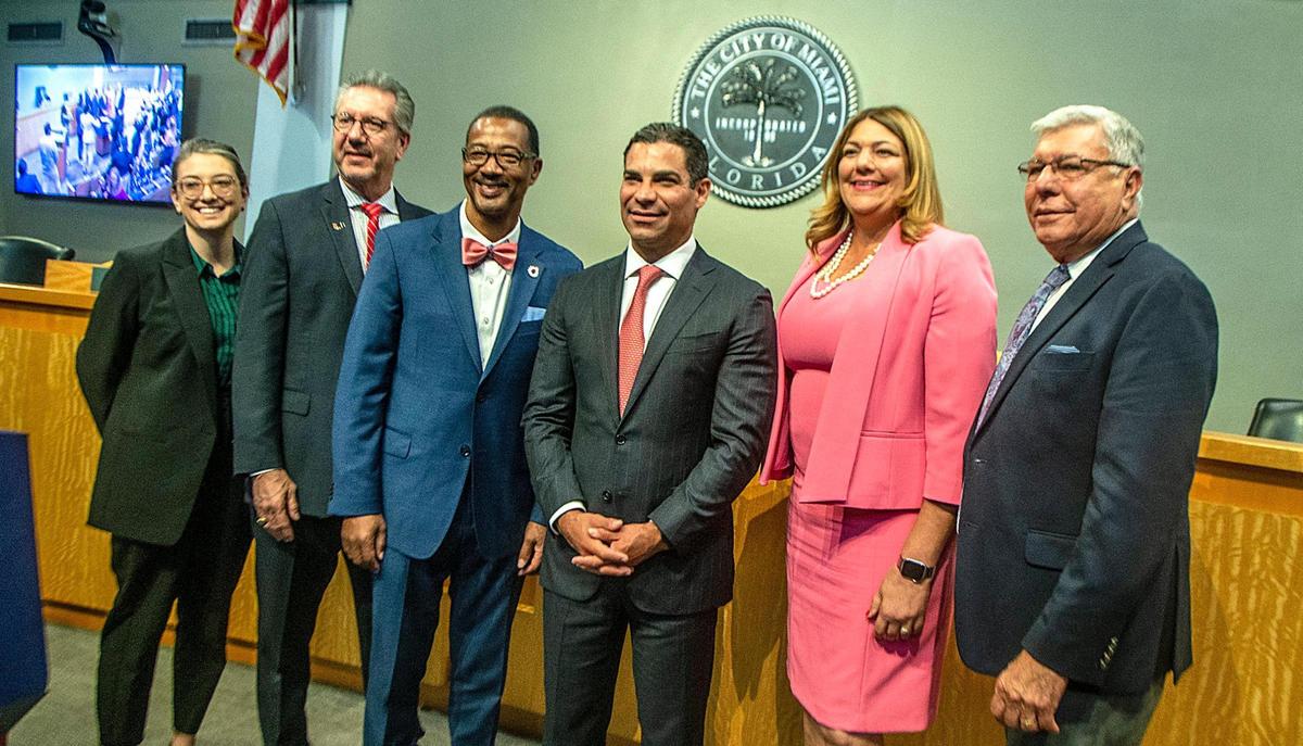 From left: Dr. Bridgette Cram, an interim vice president at Florida International University; Jeffrey Duerk, provost, University of Miami; Dr. Jaffus Hardrick, president, Florida Memorial University; Miami Mayor Francis Suarez; Madeline Pumariega, president, Miami Dade College; and Miami Commissioner Manolo Reyes after the announcement of a partnership between the city, the Miami Foundation, Citadel CEO Ken Griffin and the universities to launch the Venture Miami Scholarship Program. The scholarship will provide tuition support for in-need Miami high school graduates who have been accepted into STEM programs at participating colleges and universities. The announcement took place at Miami City Hall, on Wednesday, Oct. 12, 2022.