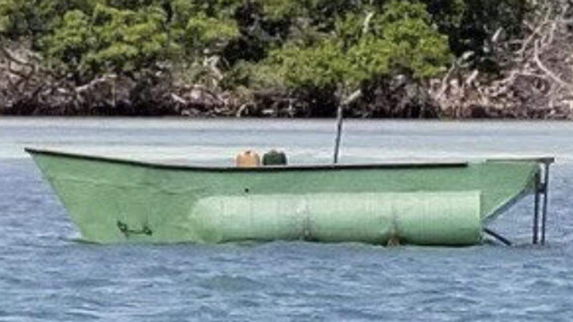 A boat is anchored off Boot Key in the Middle Florida Keys city of Marathon Friday, April 9, 2021. The U.S. Border Patrol says 13 men arrived in the vessel from Cuba.