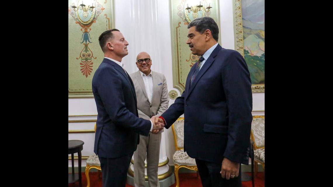 A handout photo released by Venezuela’s Presidency shows Venezuelan President Nicolás Maduro (right) speaking with U.S. President Donald Trump’s special envoy, Richard Grenell, at the Miraflores Presidential Palace in Caracas on January 31, 2025.