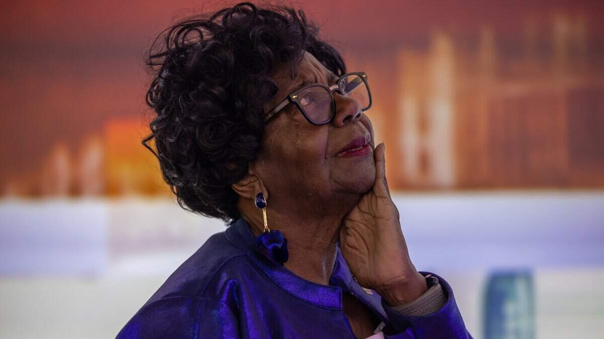 Dr. Dorothy Jenkins Fields, founder of the Black Archives, becomes emotional while viewing the Wishing Wall during a press preview of the “Documents that Forged a Nation” exhibit at the Museum of Miami in Miami, Fla., on Wednesday, June 17, 2026.