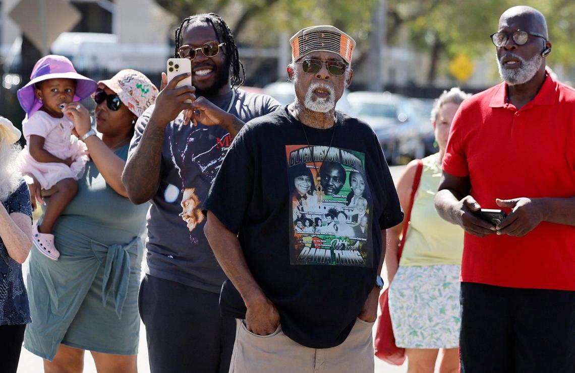 Earl Beneby, at center, and others gather for the unveiling of a marker to commemorate Liberia’s history on Saturday, February 15, 2025. Liberia, an historically Black community is in Hollywood, Florida.