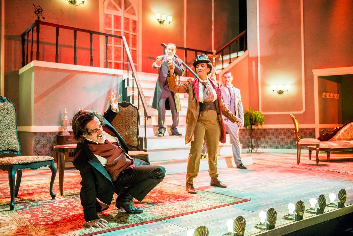 Carlos Orizondo’s Dracula dodges Karen Stephens’ Van Helsing as David Kwiat and Daniel Capote look on in the Zoetic Stage world premiere of Michael McKeever’s “Dracula.”