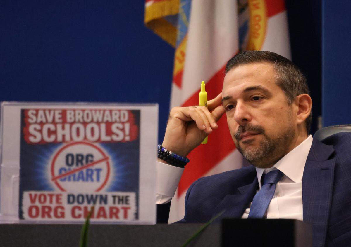 Broward County School Board member Adam Cervera listens to debate during a meeting regarding potential job cuts on Monday, May 11, 2026, in Fort Lauderdale. (Joe Cavaretta/South Florida Sun Sentinel)