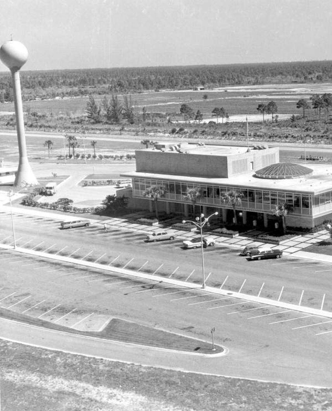 Turnpike service plaza with the landmark orange-topped pole.