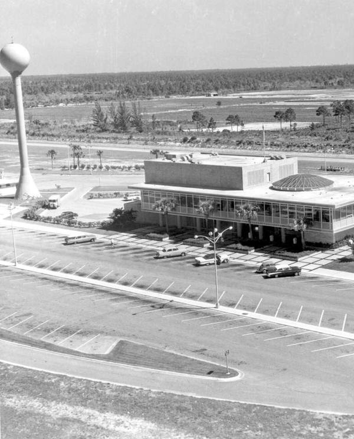 Turnpike service plaza with the landmark orange-topped pole.