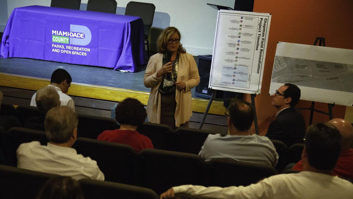 Matilde Reyes, assistant director of Planning, Design and Construction Excellence for the Miami-Dade County Parks, Recreation, and Open Spaces Department, speaks to residents of Pinecrest, Palmetto Bay, and Cutler Bay regarding the soil remediation plans for the baseball fields at Chapman Field Park. Miami-Dade County closed the ball fields about four years ago due to high levels of toxins found in the soil, leaving residents and organizations like the Howard Palmetto Baseball Softball Association without a dedicated baseball complex.