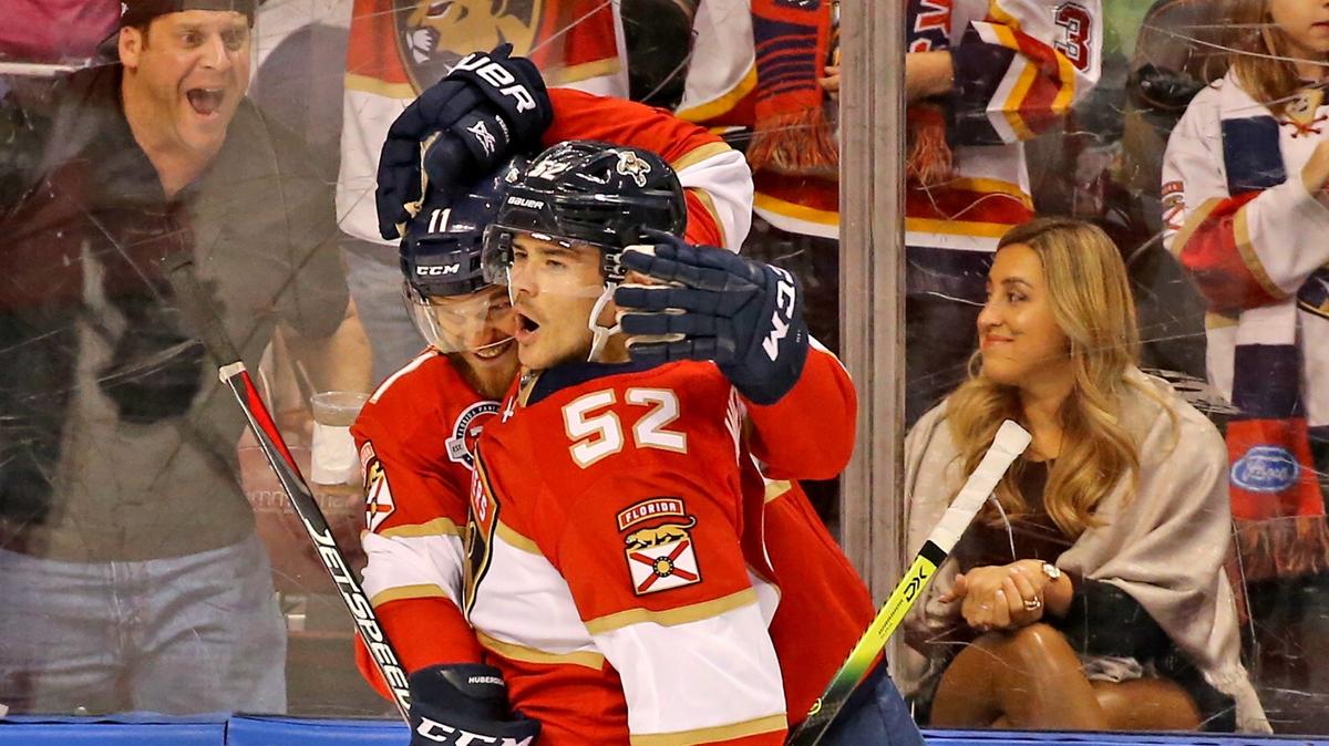 Florida Panthers MacKenzie Weegar (52) celebrates his score with Johnathan Huberdeau (11) as they play the Arizona Coyotes, at the BB&T Center in Sunrise, Florida, Thursday, March, 21, 2019.
