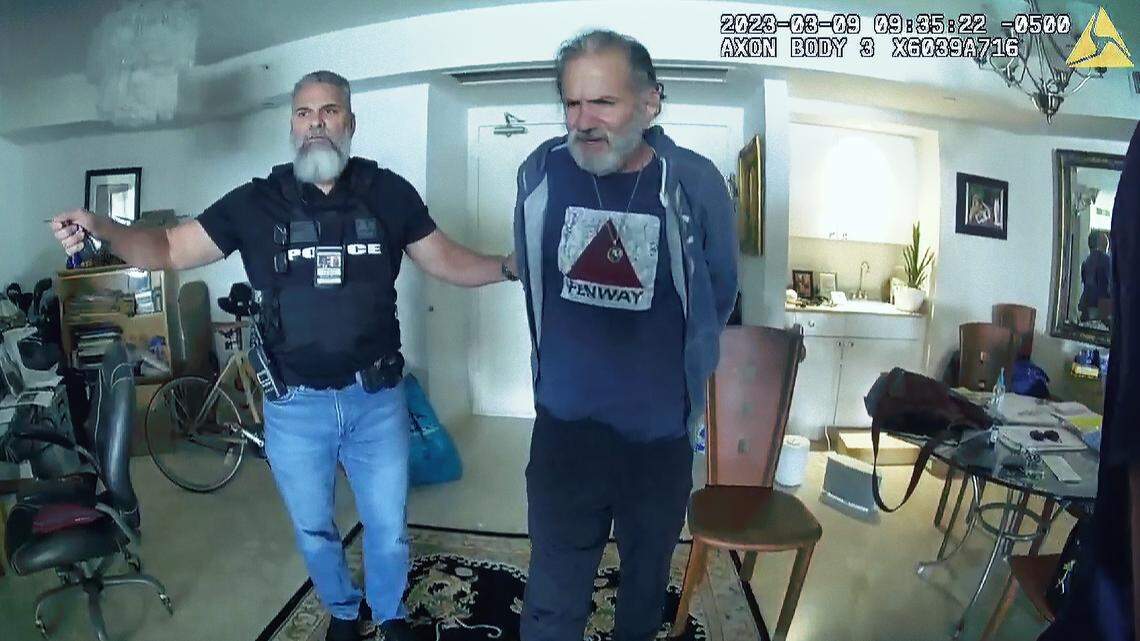 Frank Casanovas, the state attorney investigator on Kamlet’s case, with Kamlet, on the day of his arrest in March 2023.