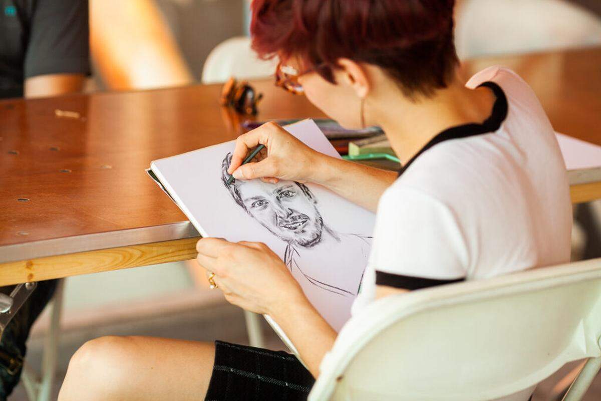 This year’s Zine Fair commemorates the 10th anniversary of Exile Projects, which hosts the fair. Visitors in 2019 had their portraits drawn by a local artist.