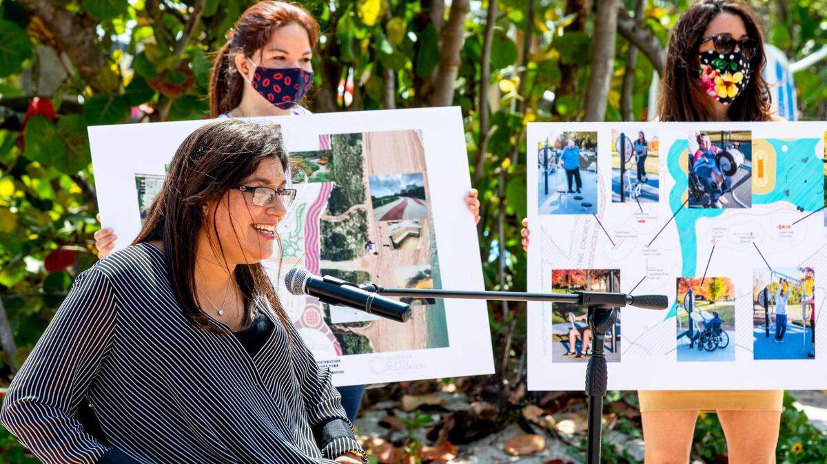 Sabrina Cohen speaks at a press conference to announce the planned construction of a new park and beachfront wheelchair-accessible viewing platform at the site of the current Beach View Park & Vita Course in Miami Beach on April 23, 2021.