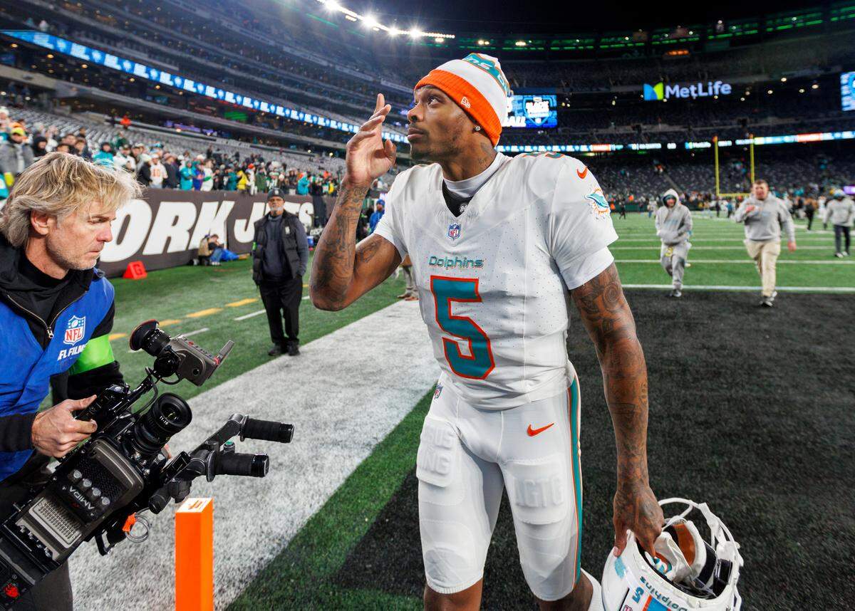 Miami Dolphins cornerback Jalen Ramsey (5) walk off the field after the Dolphins 34-13 win over the Jets during an NFL football game at MetLife Stadium on Friday, Nov. 24, 2023 in East Rutherford, New Jersey.