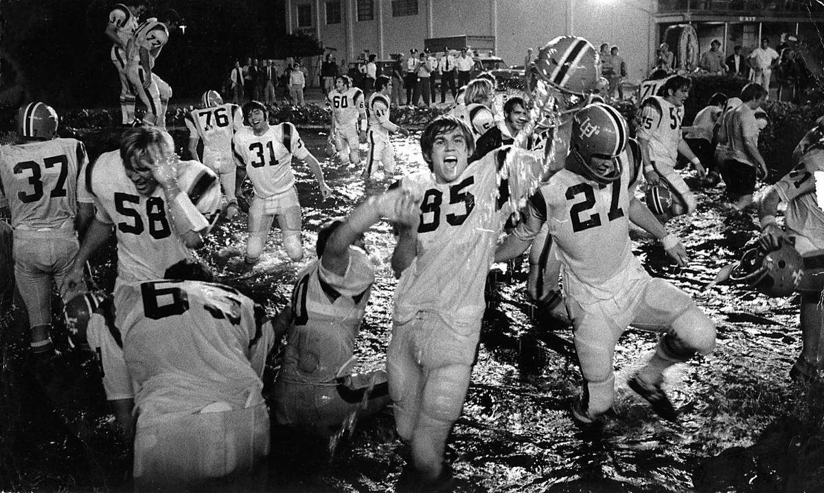 The Florida Gators celebrate in the end zone at the Orange Bowl after winning the Gator Flop Game on Nov. 27, 1971.