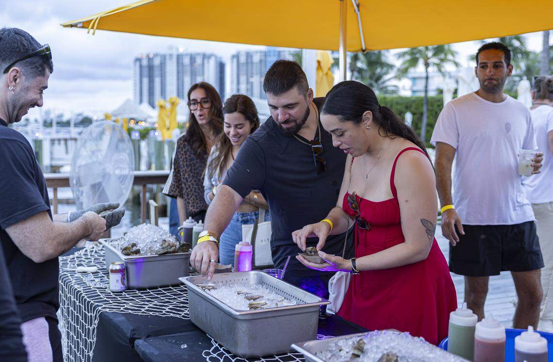 Guests serve themselves Rattlesnake Cove oysters from Apalachicola, Fla., during the Oyster Reefer by Everglades Oysters at The Standard.